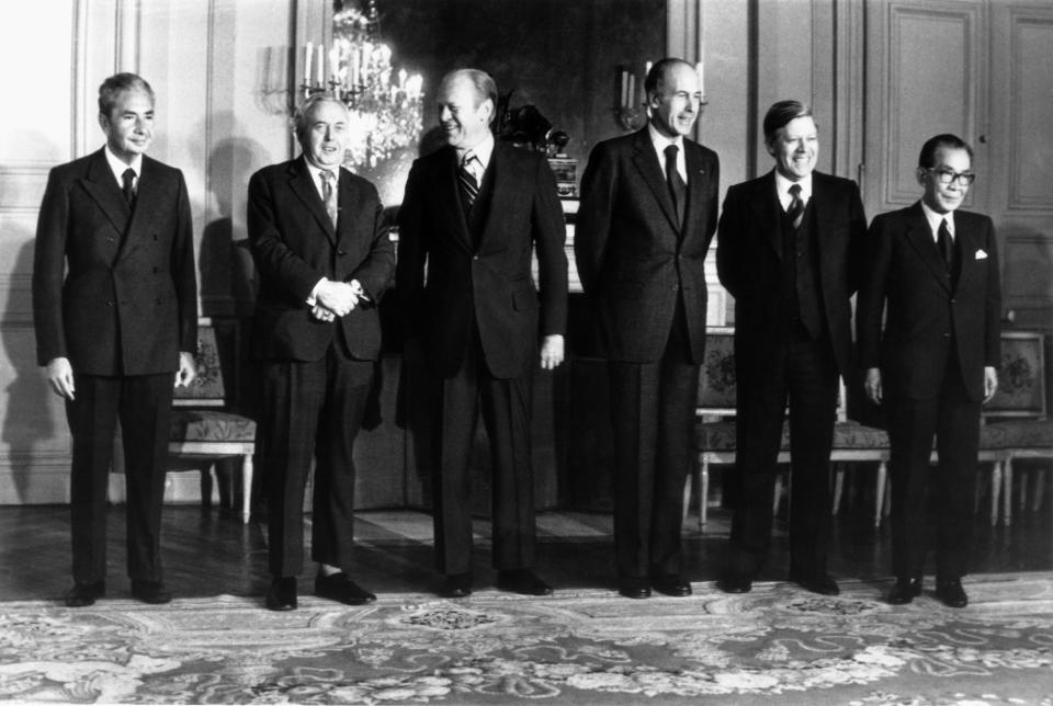 FILE - In this Nov. 17, 1975 file photo the six heads of state and government attending Economic and Monetary summit meeting at the Chateau de Rambouillet, West of Paris, pose for a group portrait before the final session. From left: Premier Aldo Moro of Italy, Premier Harold Wilson of the Great Britain, President Gerald Ford of the United States, President Valery Giscard d'Estaing of France, Chacellor Helmut Schmidt of West Germany and Premier Takeo Miki of Japan. The G7 was originally a response by leaders of Western democracies to the economic shocks and recession of the mid-1970s. (AP Photo, File)