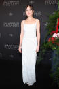 <p>The brunette star opted for a simple, white column dress by Prada and Tiffany & Co. jewellery. <em>[Photo: Getty]</em> </p>