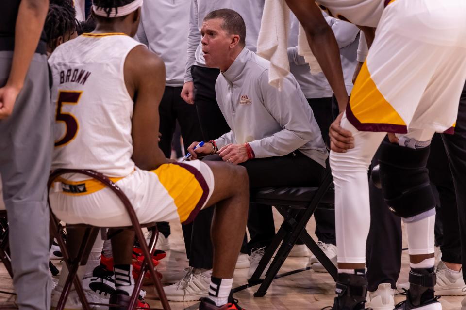 Iona coach Tobin Anderson addresses the huddle during the Gaels' 83-58 loss to Saint Joseph's at the Holiday Hoopfest at UBS Arena.