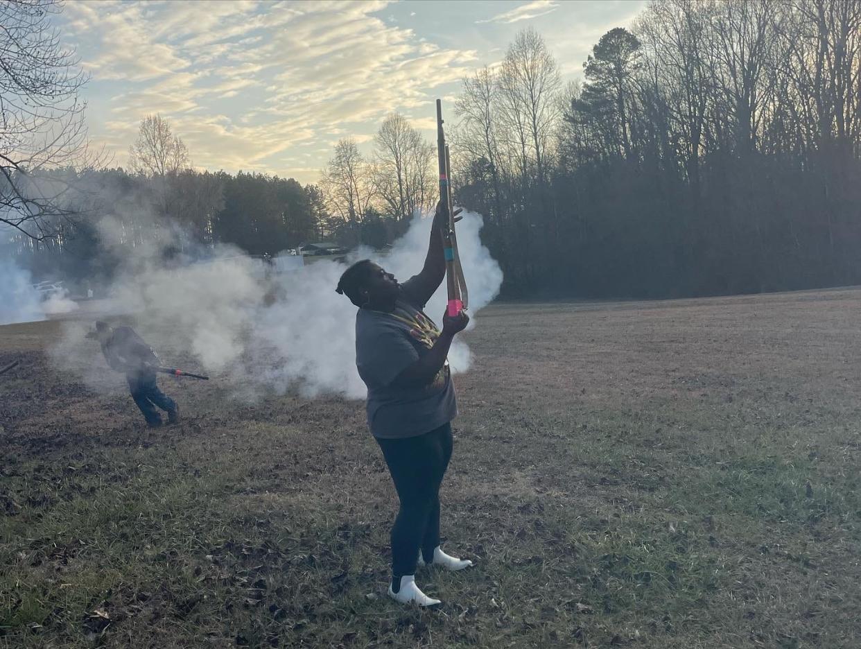 Alice Montgomery, one of the Cherryville New Year Shooters, welcomes in 2023 with traditional musket fire.