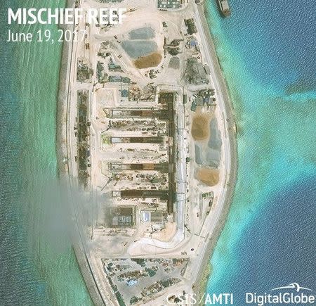 Construction is shown on Mischief Reef, in the Spratly Islands, the disputed South China Sea in this June 19, 2017 satellite image released by CSIS Asia Maritime Transparency Initiative at the Center for Strategic and International Studies (CSIS) to Reuters on June 29, 2017. MANDATORY CREDIT CSIS/AMTI DigitalGlobe/Handout via REUTERS