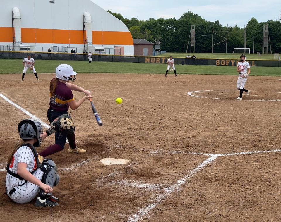 Central's BethAnne Doderer swings at a pitch from Midd North's Madi Boyce.