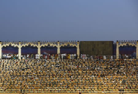 Participants wait to perform at the venue of World Culture Festival on the banks of a river in New Delhi, India, March 11, 2016. REUTERS/Adnan Abidi