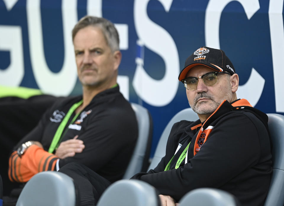 TOWNSVILLE, AUSTRALIA - JULY 01: West Tigers Board Director Lee Hagipantelis and CEO Justin Pascoe look on before the start of the round 18 NRL match between North Queensland Cowboys and Wests Tigers at Qld Country Bank Stadium on July 01, 2023 in Townsville, Australia. (Photo by Ian Hitchcock/Getty Images)