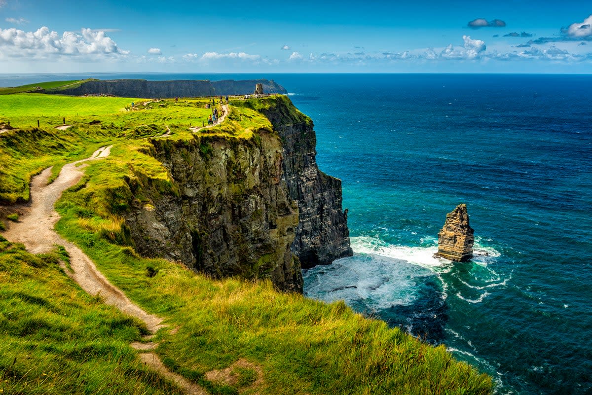 The woman was visiting the area with friends when she fell from the cliffs  (Getty)