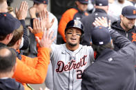 Detroit Tigers' Javier Baez celebrates in the dugout after scoring on Andy Ibanez's sacrifice fly off Chicago White Sox's Garrett Crochet during the third inning of the White Sox's home opener baseball game Thursday, March 28, 2024, in Chicago. (AP Photo/Charles Rex Arbogast)
