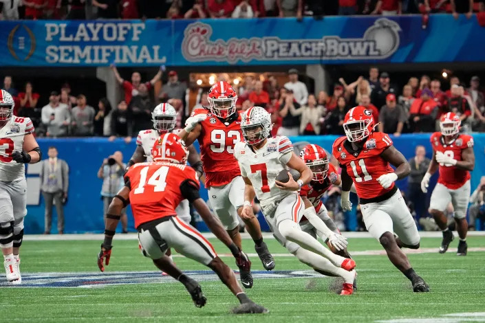 Ohio State quarterback C.J. Stroud ran for 34 yards on 12 carries against Georgia.