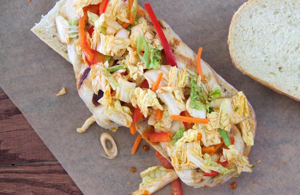 <p>This kimchi slaw is made with cabbage, red bell peppers and carrots. Serve the dish as a side or on <a href="https://www.thedailymeal.com/our-50-best-burger-recipes-gallery?referrer=yahoo&category=beauty_food&include_utm=1&utm_medium=referral&utm_source=yahoo&utm_campaign=feed" rel="nofollow noopener" target="_blank" data-ylk="slk:top of a burger;elm:context_link;itc:0;sec:content-canvas" class="link ">top of a burger</a>.</p> <p><a href="https://www.thedailymeal.com/recipes/easy-kimchi-slaw-recipe?referrer=yahoo&category=beauty_food&include_utm=1&utm_medium=referral&utm_source=yahoo&utm_campaign=feed" rel="nofollow noopener" target="_blank" data-ylk="slk:For the Easy Kimchi Slaw recipe, click here.;elm:context_link;itc:0;sec:content-canvas" class="link ">For the Easy Kimchi Slaw recipe, click here.</a></p>