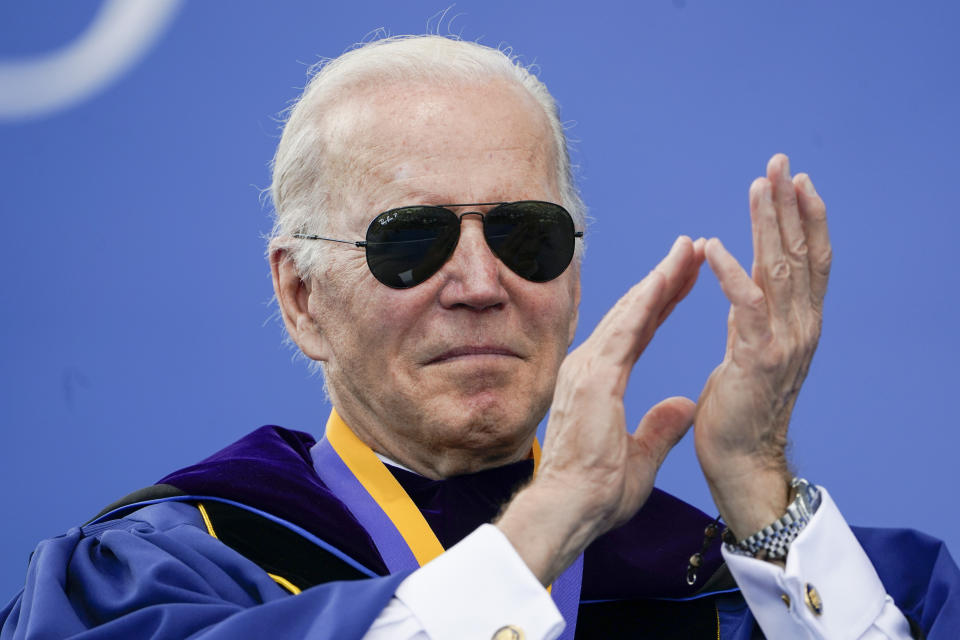 President Joe Biden applauds during the University of Delaware Class of 2022 commencement ceremony in Newark, Del., Saturday, May 28, 2022. (AP Photo/Manuel Balce Ceneta)