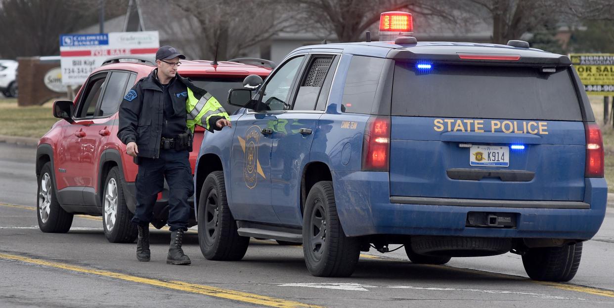 Michigan State Police, like Trooper Jack Taeff here on S. Telegraph Road in Monroe, will be looking for drunken drivers during the Labor Day holiday.