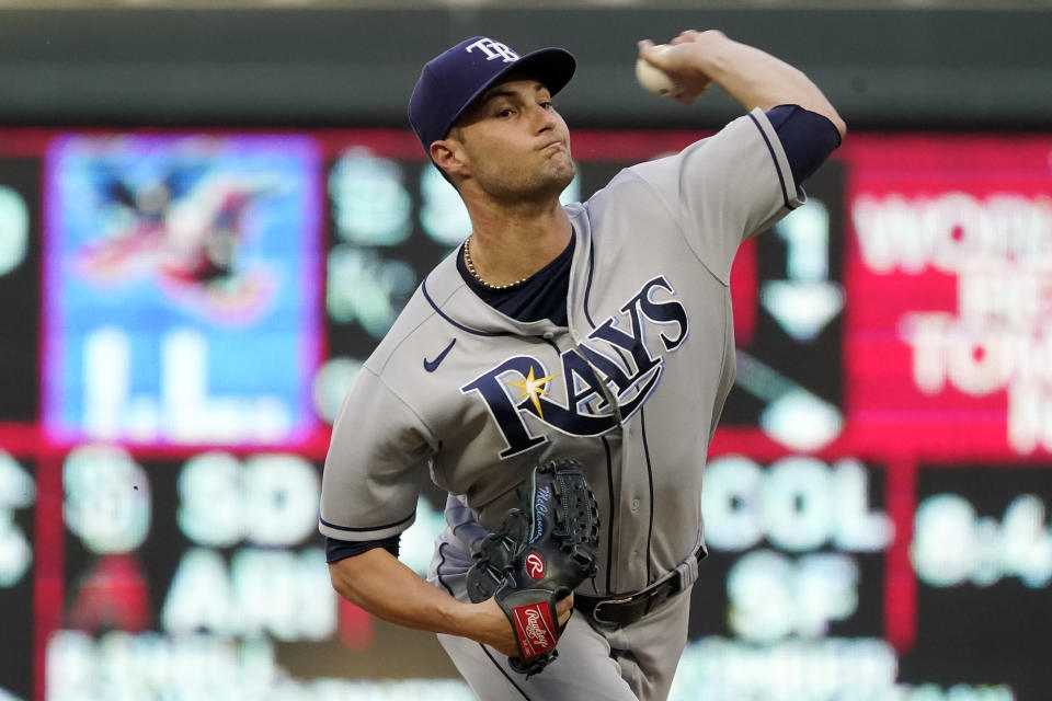 Tampa Bay Rays pitcher Shane McClanahan throws to a Tampa Bay Rays batter during the first inning of a baseball game Friday, Aug. 13, 2021, in Minneapolis. (AP Photo/Jim Mone)