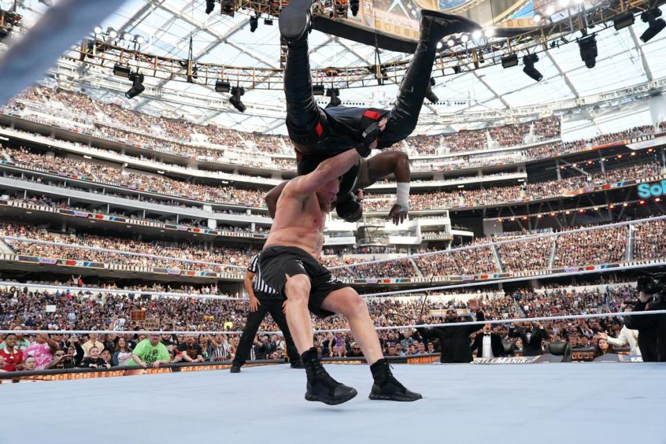Brock Lesnar gives an F-5 to Omos during their match at WrestleMania 39 from SoFi Stadium in Inglewood, California.