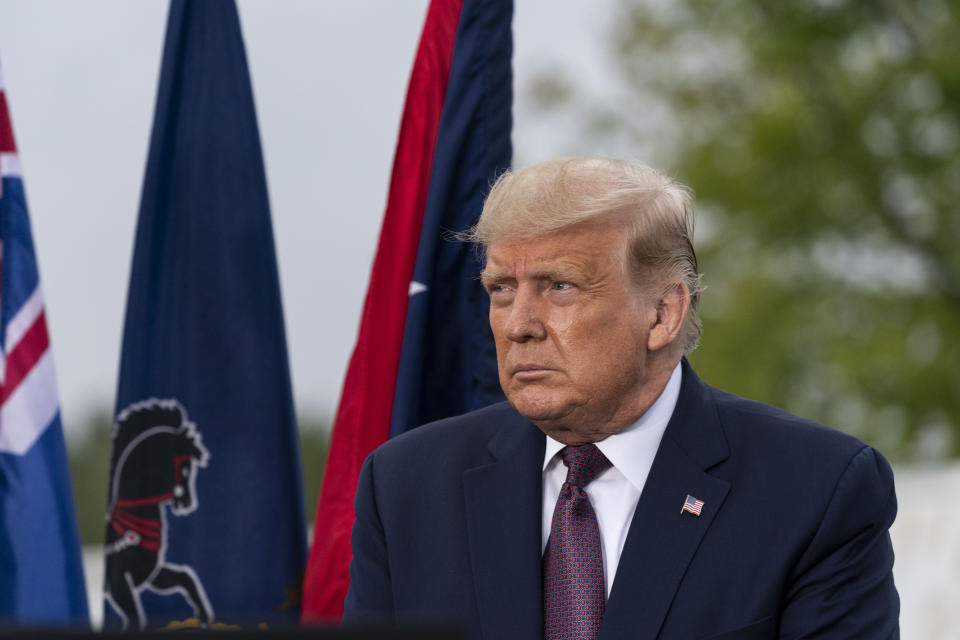 President Donald Trump is seated before speaking at a 19th anniversary observance of the Sept. 11 terror attacks, at the Flight 93 National Memorial in Shanksville, Pa., Friday, Sept. 11, 2020. (AP Photo/Alex Brandon)