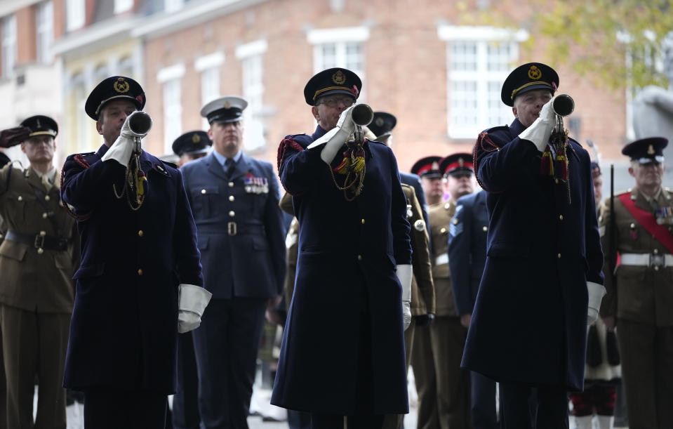 Buglers play The Last Post during an Armistice Day ceremony at the Menin Gate Memorial to the Missing in Ypres, Belgium, Thursday, Nov. 11, 2021. (AP Photo/Virginia Mayo)