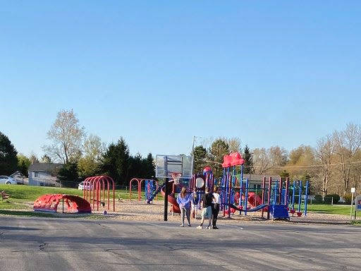 kids playing playground outside michigan