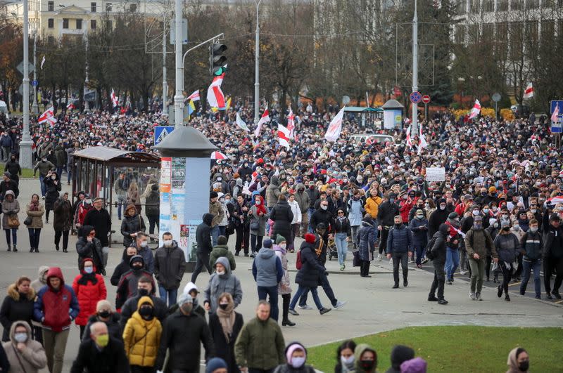 Belarusian opposition supporters hold a rally in Minsk