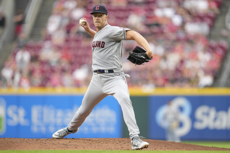 Cleveland Guardians starting pitcher Noah Syndergaard throws to a Cincinnati Reds batter during the first inning of a baseball game in Cincinnati, Wednesday, Aug. 16, 2023. (AP Photo/Jeff Dean)