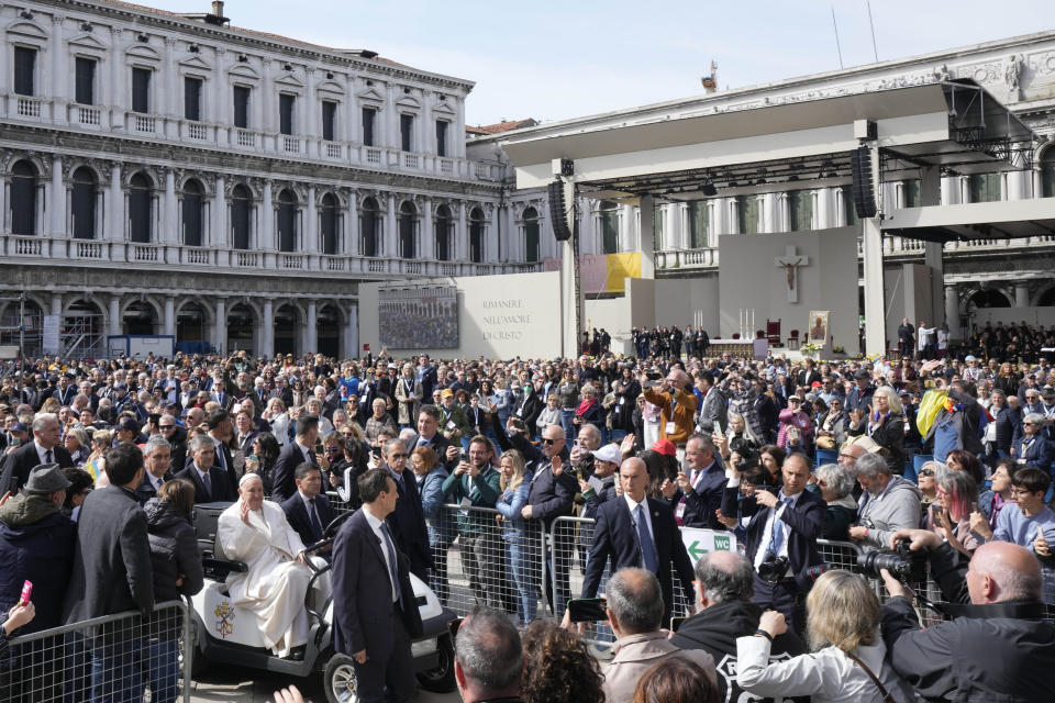 Pope Francis arrives in St. Mark's Square to celebrate a mass in Venice, Italy, Sunday, April 28, 2024. The Pontiff arrived for his first-ever visit to the lagoon town including the Vatican pavilion at the 60th Biennal of Arts. (AP Photo/Antonio Calanni)