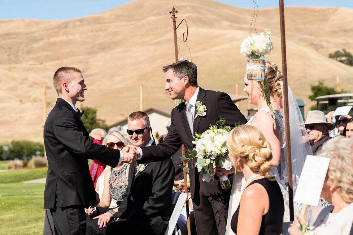 Benjie Wells, Tobin Bolter’s father-in-law, handed off his daughter, Abbey Bolter, during the Bolter’s wedding in June 2018. Ada County Sheriff Deputy Tobin Bolter was shot on April 20, 2024. The 27-year-old died at Saint Alphonsus Regional Medical Center in Boise the next day. SHANE LOUIS/Provided