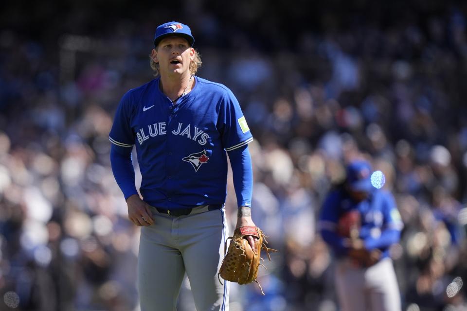 Toronto Blue Jays pitcher Bowden Francis reacts after New York Yankees' Giancarlo Stanton hit a grand slam during the third inning of a baseball game Sunday, April 7, 2024, in New York. (AP Photo/Frank Franklin II)