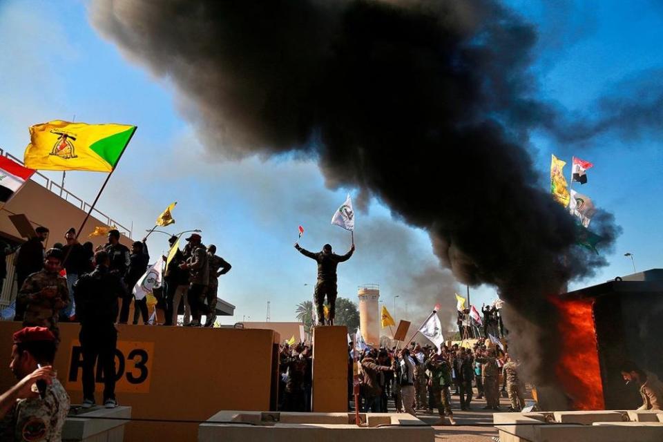 The scene Tuesday outside the U.S. Embassy in Baghdad | Khalid Mohammed/AP/Shutterstock