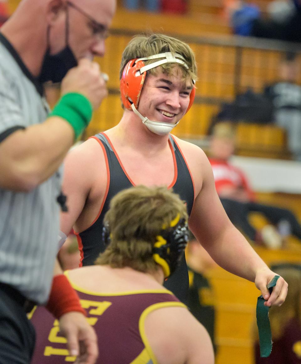 Washington's Donnie Hidden flashes a smile after defeating East Peoria's Zach Eaton in the 195-pound division of the Class 2A wrestling regional final Saturday, Feb. 5, 2022 at Washington Community High School.