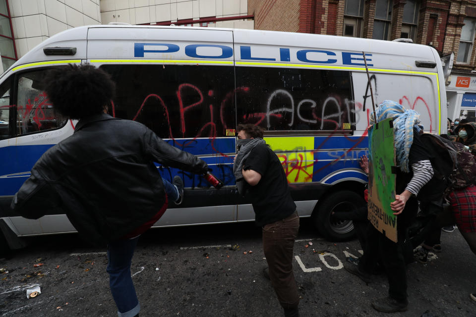 Damaged is caused to a police van outside Bridewell Police Station as people take part in a 'Kill the Bill' protest in Bristol, demonstrating against the Government's controversial Police and Crime Bill. Picture date: Sunday March 21, 2021. (Photo by Andrew Matthews/PA Images via Getty Images)