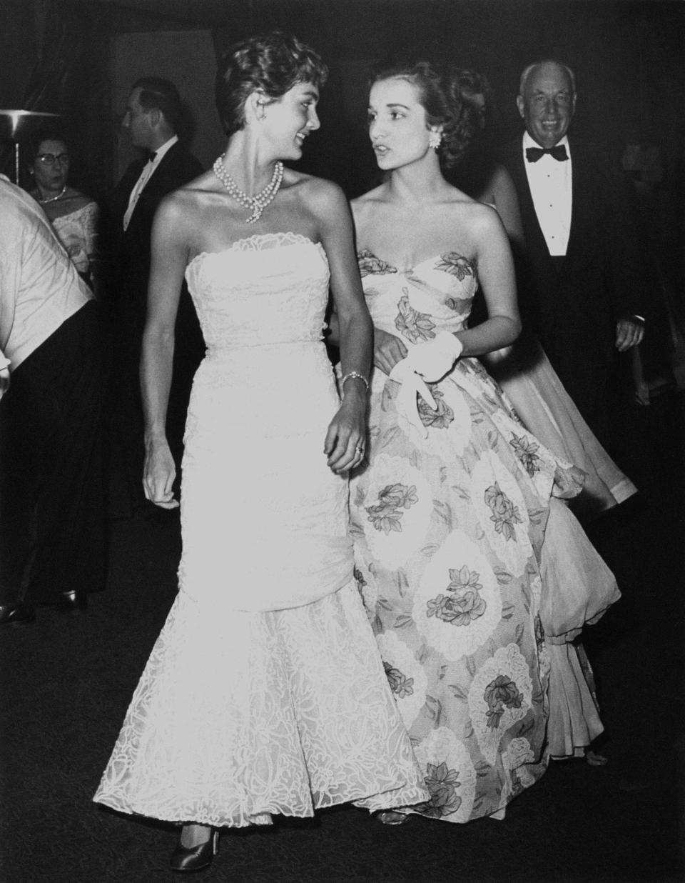 Kennedy and her sister attend the Franco-American Ball at the Waldorf Astoria.