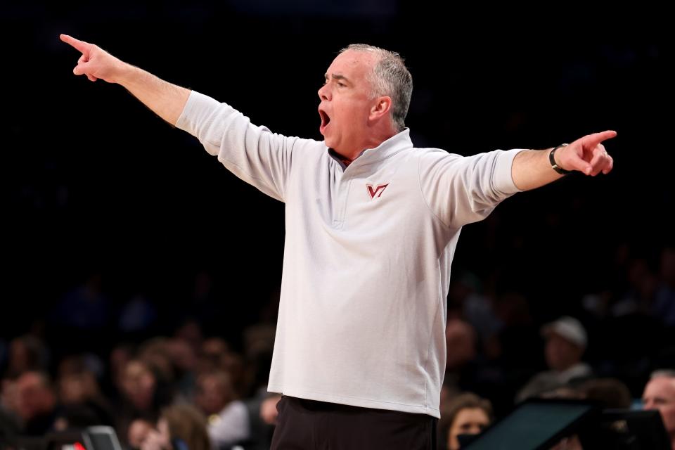 Mar 10, 2022; Brooklyn, NY, USA; Virginia Tech Hokies head coach Mike Young coaches his team against the Notre Dame Fighting Irish during the first half at Barclays Center.