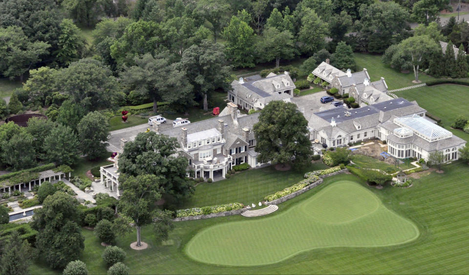 <p> FILE -This Friday, July 26, 2013, file photo shows the Greenwich, Conn. estate belonging to billionaire hedge fund owner Stephen Cohen, Cohen's company, hedge fund giant SAC Capital Advisors agreed Monday, Nov. 4, 2013, to plead guilty to fraud charges and to pay a $1.8 billion financial penalty. (AP Photo/Vincent T. Vuoto, File)</p>