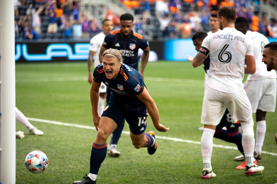 FC Cincinnati defender Nick Hagglund (14) celebrates after scoring a goal in the 82nd minute to tie the game 2-2 in the second half of the MLS match at TQL Stadium in Cincinnati on Sunday, May 16, 2021. Inter Miami defeated FC Cincinnati 3-2. 