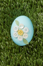 <p>Hot-glue small white and yellow buttons, arranged in a flower shape, to a natural or dyed egg to achieve this pretty look. Attach paper leaves with hot glue to finish it off.</p><p><a class="link " href="https://www.amazon.com/Assorted-Childrens-Painting-Handmade-Ornament/dp/B076FLR6X1?tag=syn-yahoo-20&ascsubtag=%5Bartid%7C10050.g.1111%5Bsrc%7Cyahoo-us" rel="nofollow noopener" target="_blank" data-ylk="slk:SHOP BUTTONS;elm:context_link;itc:0;sec:content-canvas">SHOP BUTTONS</a></p>