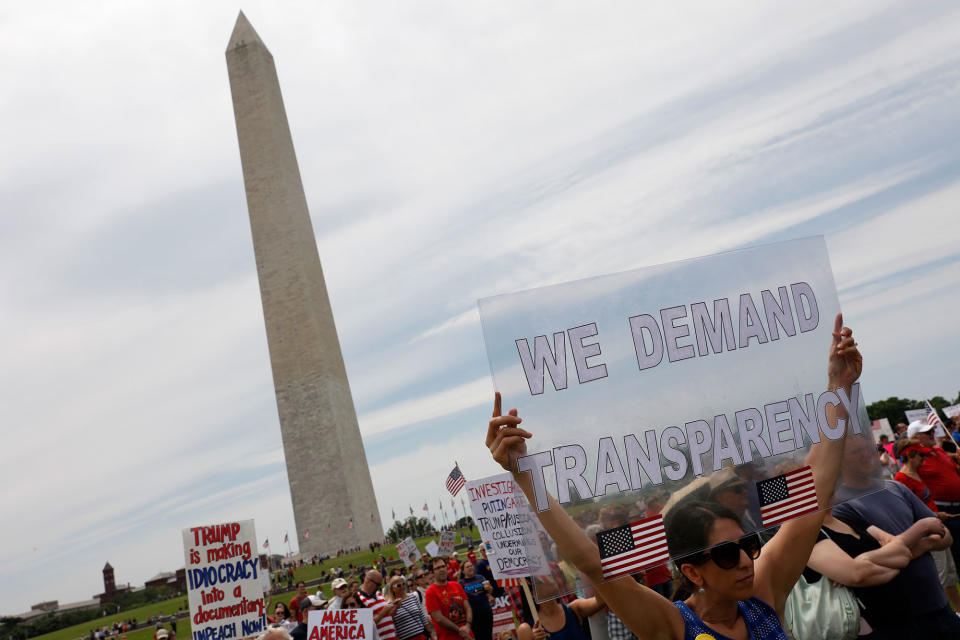 <p>Demonstrators gather near the Washington Monument during the “March for Truth” on June 3, 2017 in Washington, D.C. (Photo: Aaron P. Bernstein/Getty Images) </p>