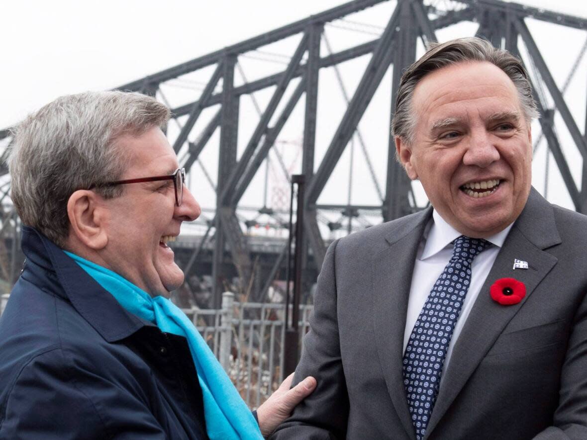 Quebec City Mayor Régis Labeaume and Quebec Premier François Legault shortly after the CAQ won the 2018 election. Legault had promised to begin construction of a third link in his first term. (Jacques Boissinot/The Canadian Press - image credit)