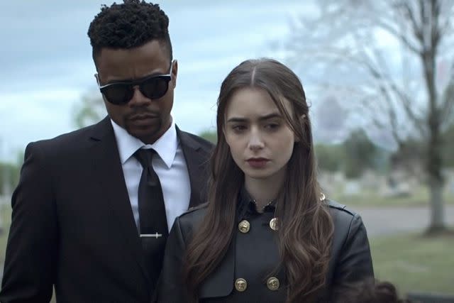 <p>Vertical Entertainment/Everett Collection</p> Marque Richardson and Lily Collins in 'Inheritance'