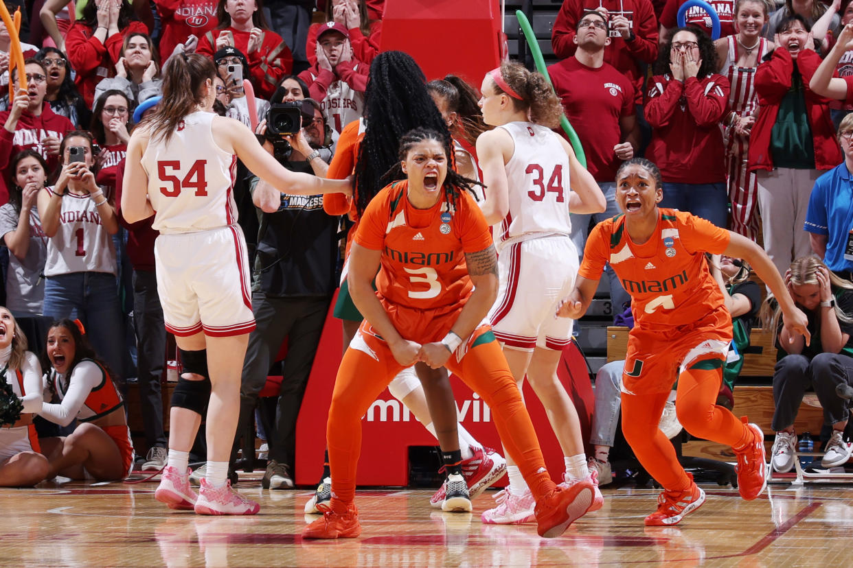 Miami's Destiny Harden reacts after making the game-winning shot against the Indiana Hoosiers during the second round of the NCAA women's tournament on March 20, 2023, at Simon Skjodt Assembly Hall in Bloomington, Indiana. (Joe Robbins/NCAA Photos via Getty Images)