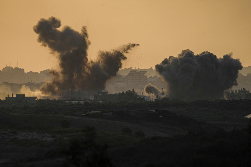 Smoke rises following an Israeli airstrike in the Gaza Strip, as seen from southern Israel, Sunday, Oct. 15, 2023. (AP Photo/Ariel Schalit)
