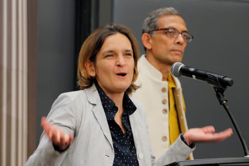 FILE PHOTO: Banerjee and Duflo, two of the three winners of the 2019 Nobel Prize in Economics, speak at news conference at MIT in Cambridge