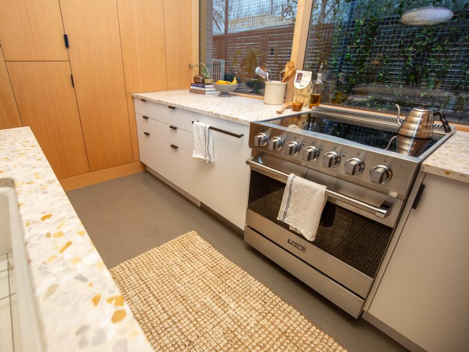 A kitchen with a stove and oven.