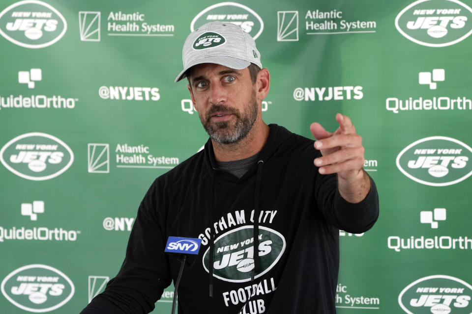 New York Jets quarterback Aaron Rodgers speaks to reporters after a practice at the NFL football team's training facility in Florham Park, N.J., Thursday, July 20, 2023. (AP Photo/Seth Wenig)