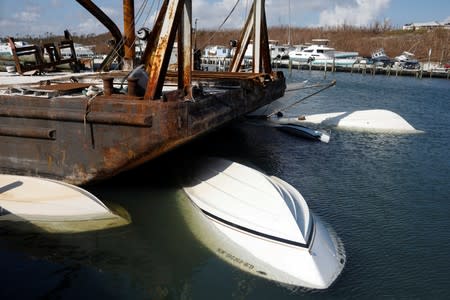 Capsized boats are seen at a marina after Hurricane Dorian hit the Abaco Islands in Marsh Harbour