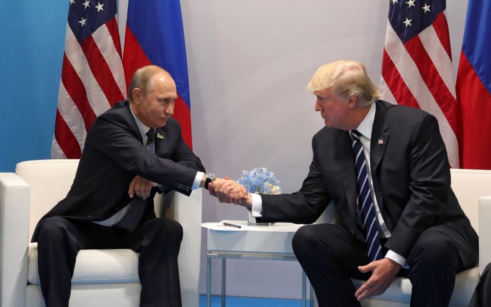 Russian President Vladimir Putin and U.S. President Donald Trump in Hamburg, Germany on July 7. Photo: Reuters