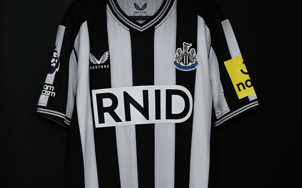 Royal National Institute for Deaf People (RNID) branding on Newcastle shirts marking the launch of special 'haptic' shirts that will make matchday more accessible for those with hearing loss