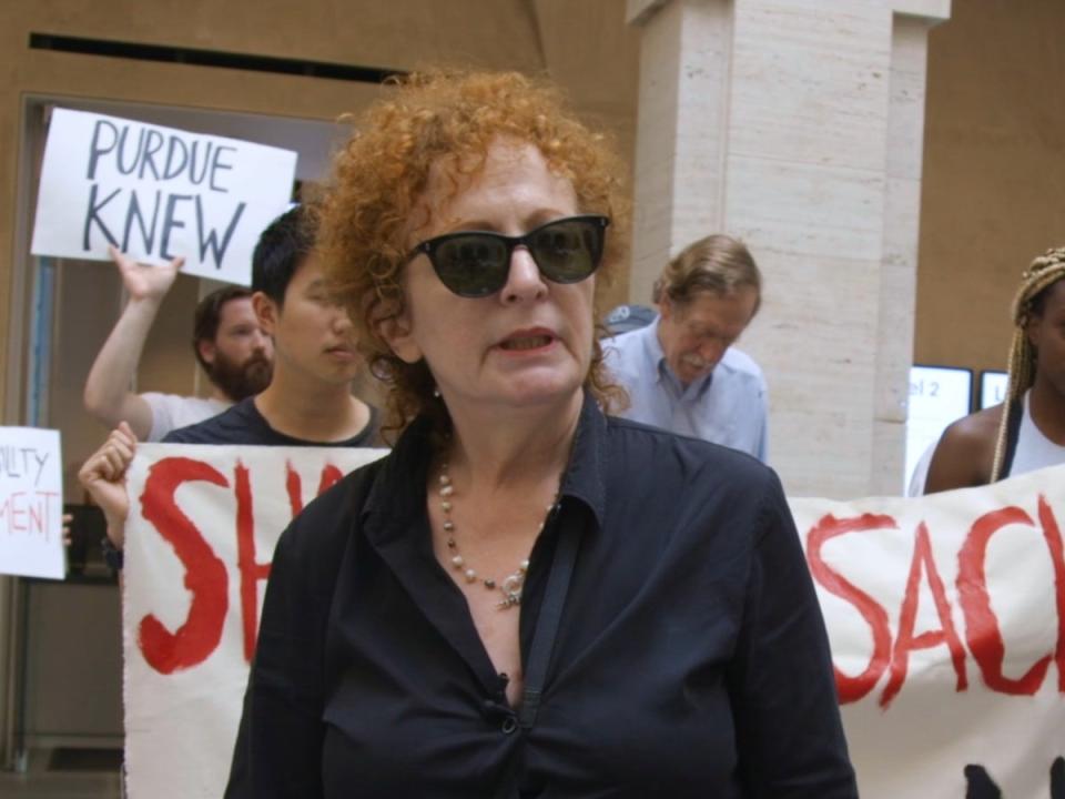 Nan Goldin attending a protest against Purdue Pharma and the Sackler family, as seen in ‘All the Beauty and the Bloodshed’ (Neon)