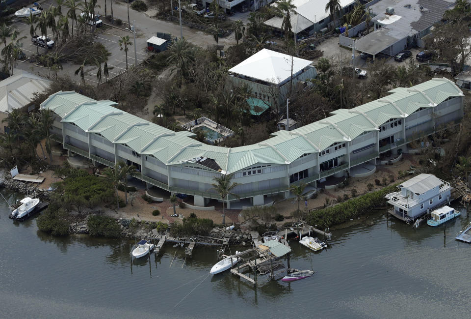 <p>A roof is damaged on a building in the aftermath of Hurricane Irma on Sept. 12, 2017, in Key West, Fla. (Photo: Chris O’Meara/AP) </p>