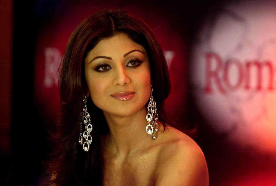 ** FILE ** Bollywood actress Shilpa Shetty looks on during a promotional event for the United Breweries group in Bombay, India in this May 22, 2006 file photo. Britain's hit reality television show   Celebrity Big Brother   was on Tuesday Jan 16, 2007, accused of racism after the country's media watchdog Ofcom received over 3,500 complaints alleging that the show's contestants are targeting Bollywood star Shilpa Shetty because she's Indian. (AP Photo/Aijaz Rahi, File)