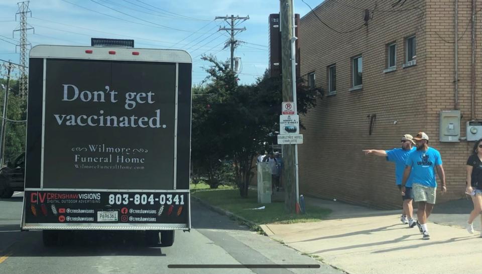 The ad from BooneOakley driving around Charlotte on Sunday.