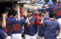 Minnesota Twins' Ryan Jeffers is greeted in the dugout after hitting a grand slam in the fourth inning of a baseball game against Detroit Tigers, Wednesday, July 28, 2021, in Minneapolis. (Glen Stubbe/Star Tribune via AP)