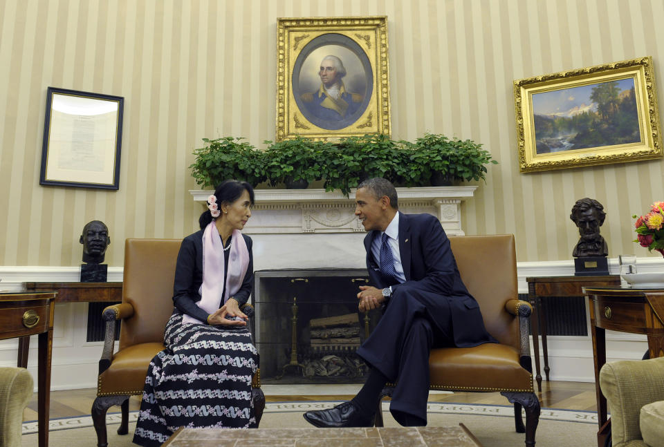 FILE - Then U.S. President Barack Obama meets with Myanmar democracy leader Aung San Suu Kyi in the Oval Office of the White House in Washington on Sept. 19, 2012. Myanmar court on Monday, Dec. 6, 2021, sentenced ousted leader Suu Kyi to 4 years for incitement and breaking virus restrictions, then later in the day state TV announced that the country's military leader reduced the sentence by two years. (AP Photo/Susan Walsh, File)