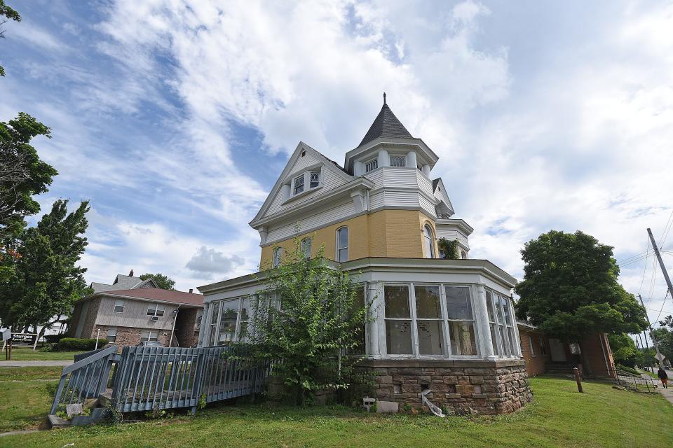 Anthony Brown, who lives in California, bought this house at 81 Sturges Ave. for $32,000 online, sight unseen, with plans to convert it into a transitional care program to reintegrate homeless people back into the community.